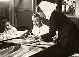 Diakonisse in der Pflege, um 1930.